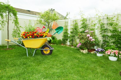 Garden beds showing separated compost and recycling bins in Plaistow