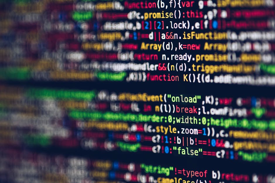 A close-up image of computer code displayed on a screen with colorful syntax highlighting, featuring lines of JavaScript or similar programming language in various colors such as yellow, green, red, a